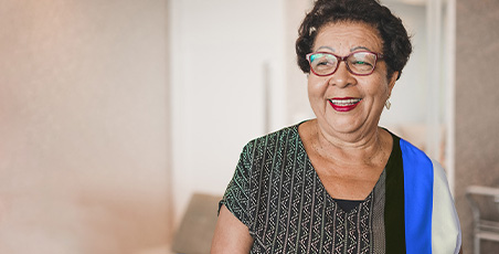 Older women wearing glasses and smiling